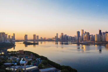 Sharjah aerial city skyline view with water
