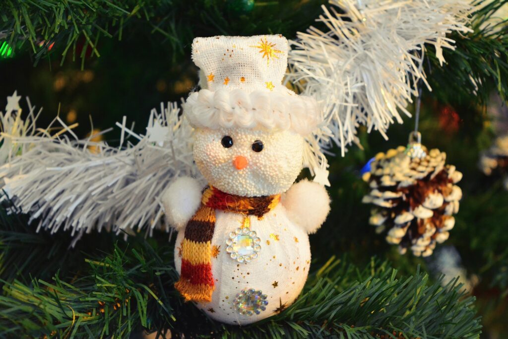 Artificial Christmas tree with snowman decoration